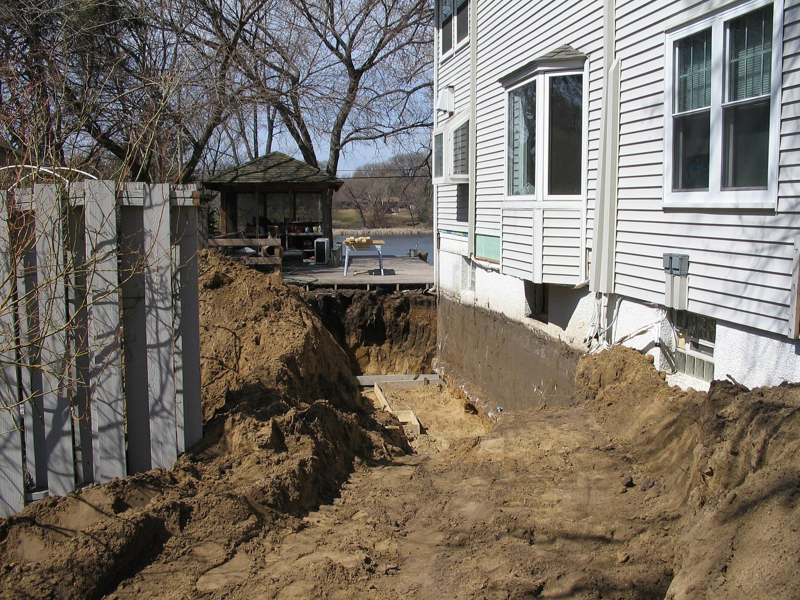 excavation outside of a minneapolis home to expand the basement footprint