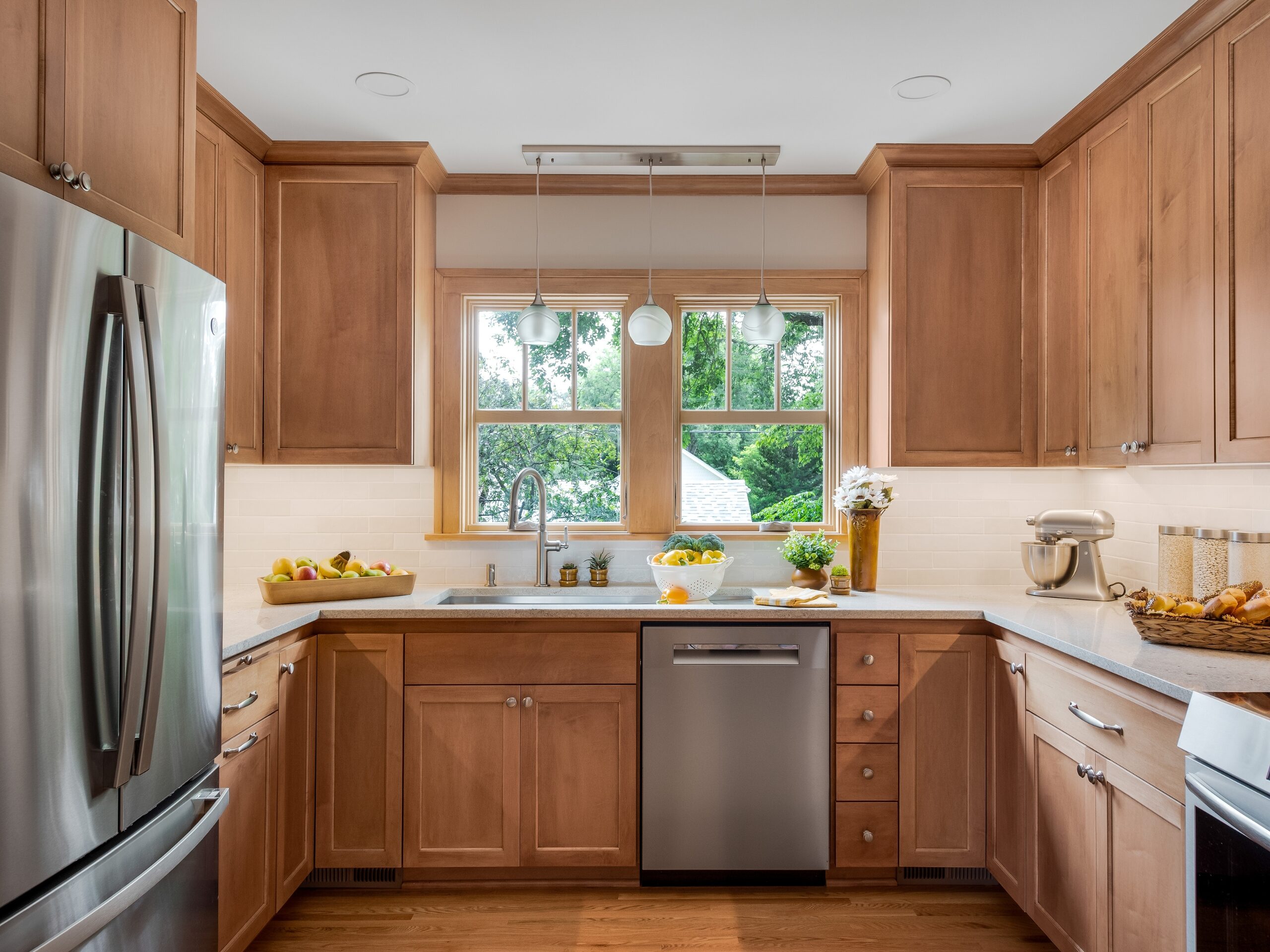 Transitional Kitchen Design with Craftsman Influence with stainless steel appliances