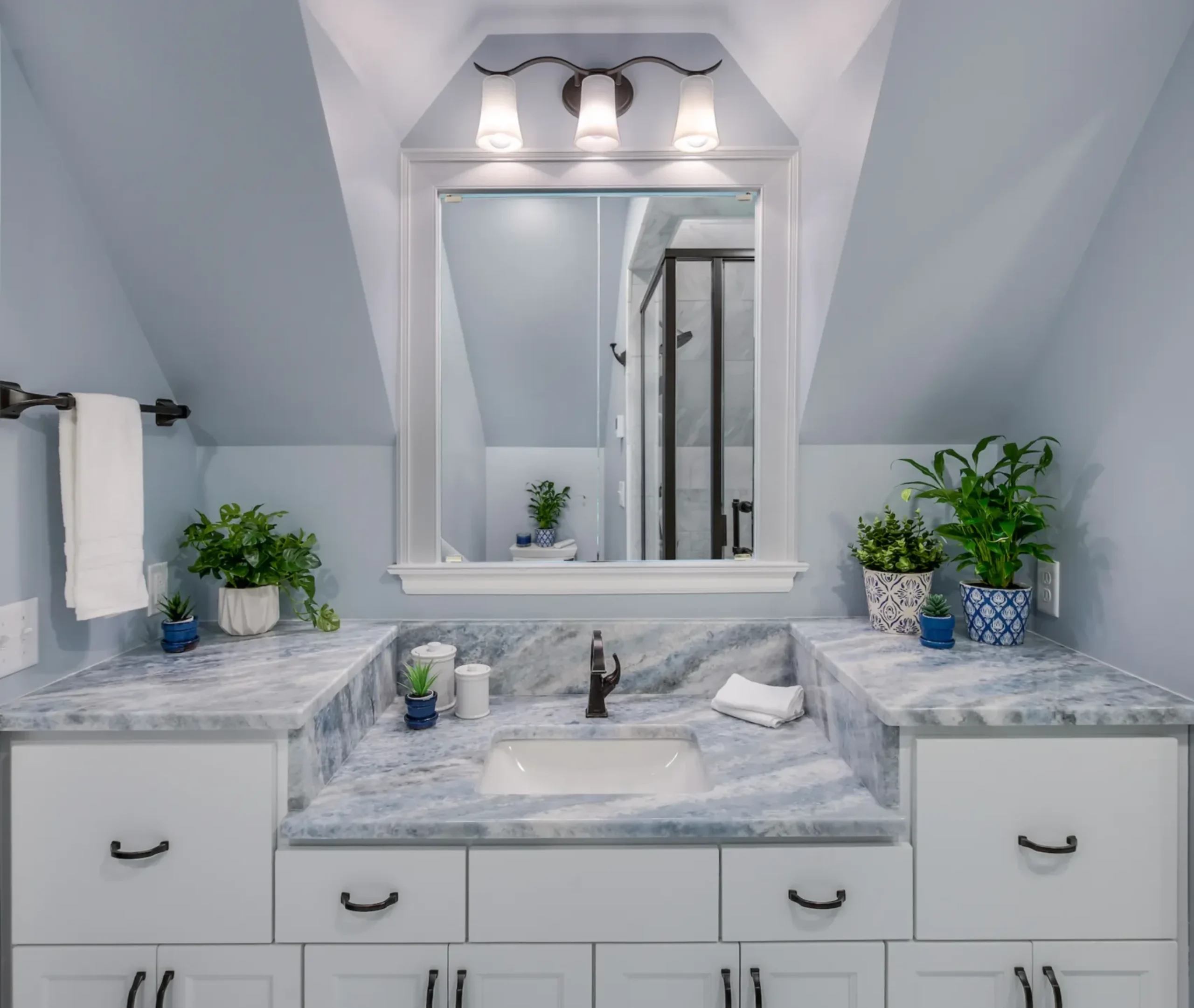 Accessible bathroom vanity with lowered makeup station in Lowry Hill